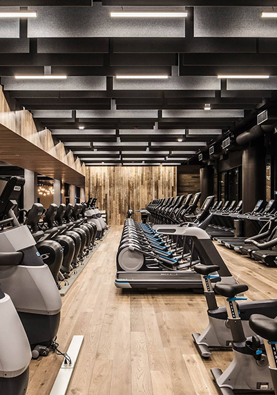 a large room with exercise machines