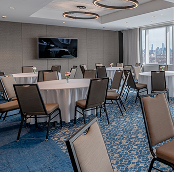 a room with tables and chairs