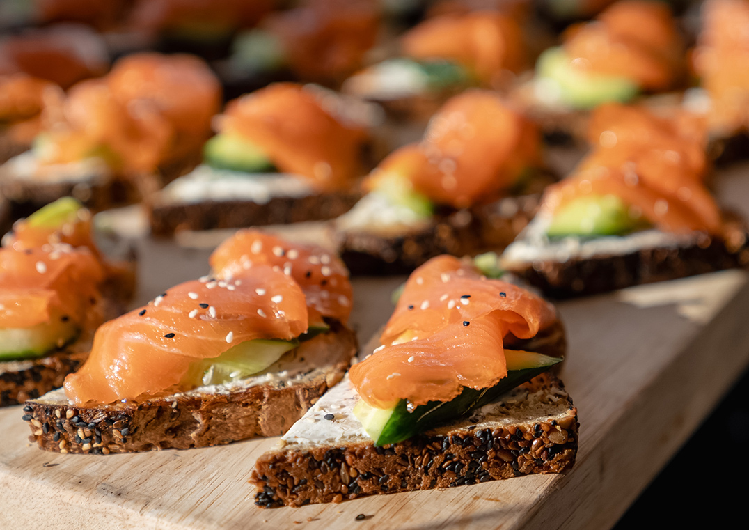 a group of food on a wooden board