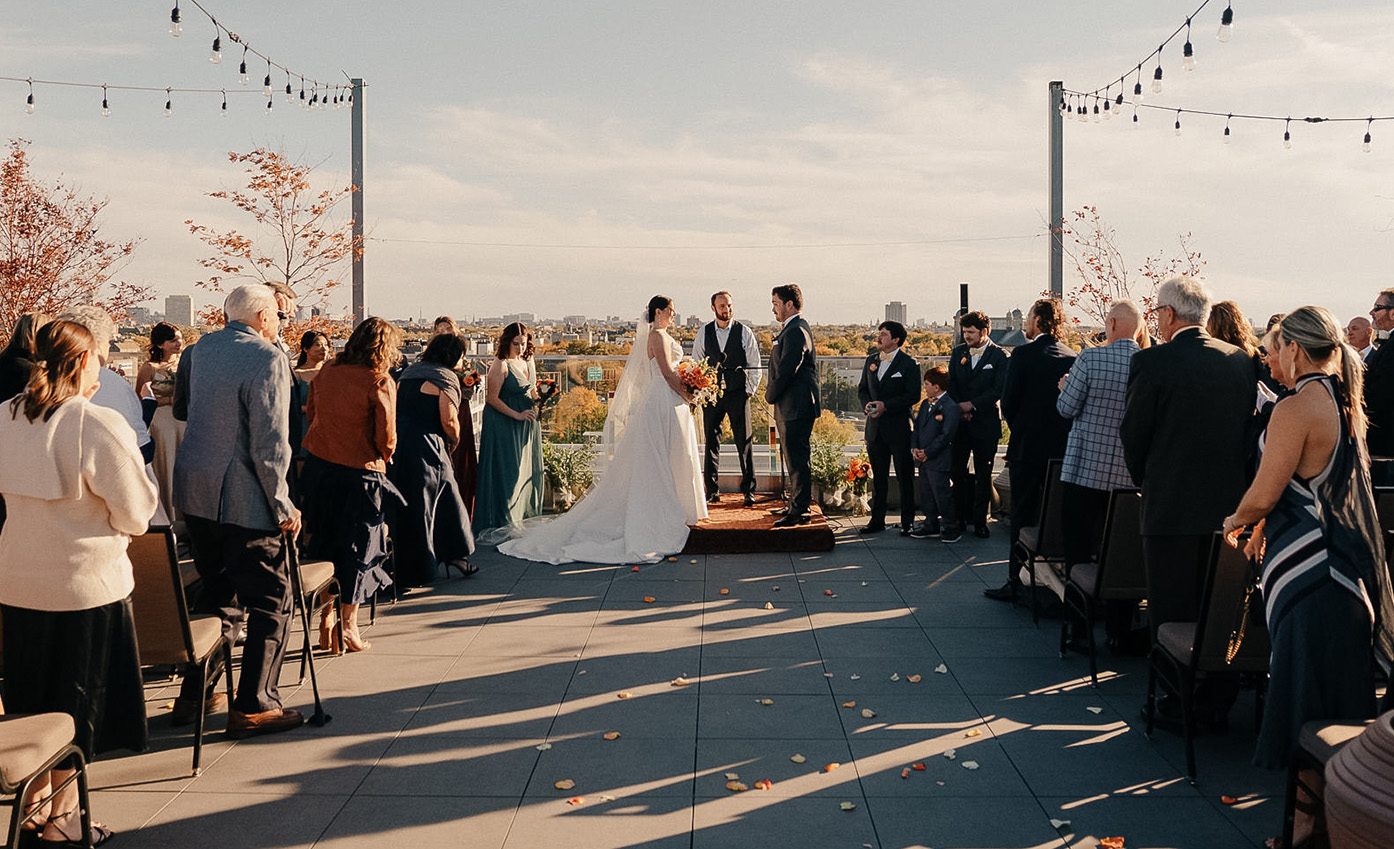 a bride and groom on a rooftop
