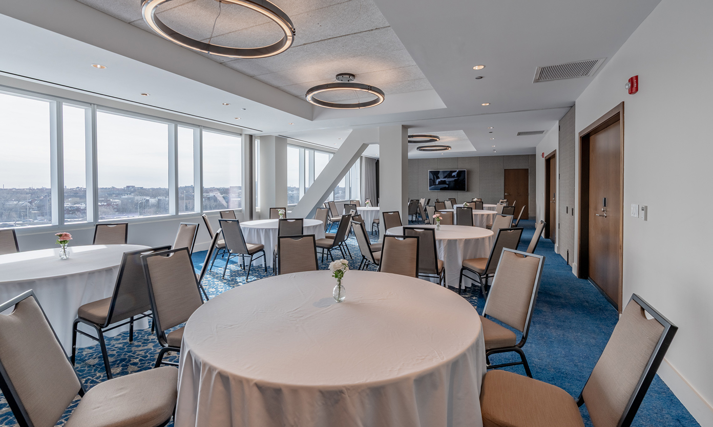a room with tables and chairs