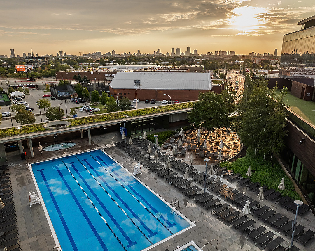 a swimming pool and a city skyline