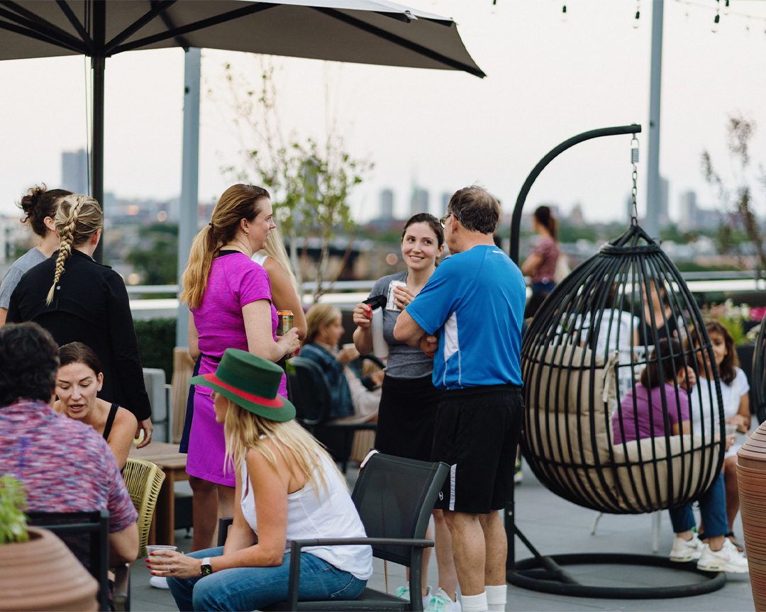 a group of people sitting outside