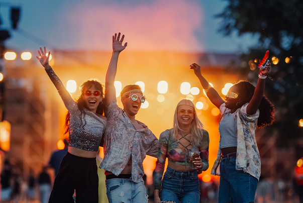 a group of people with their arms up