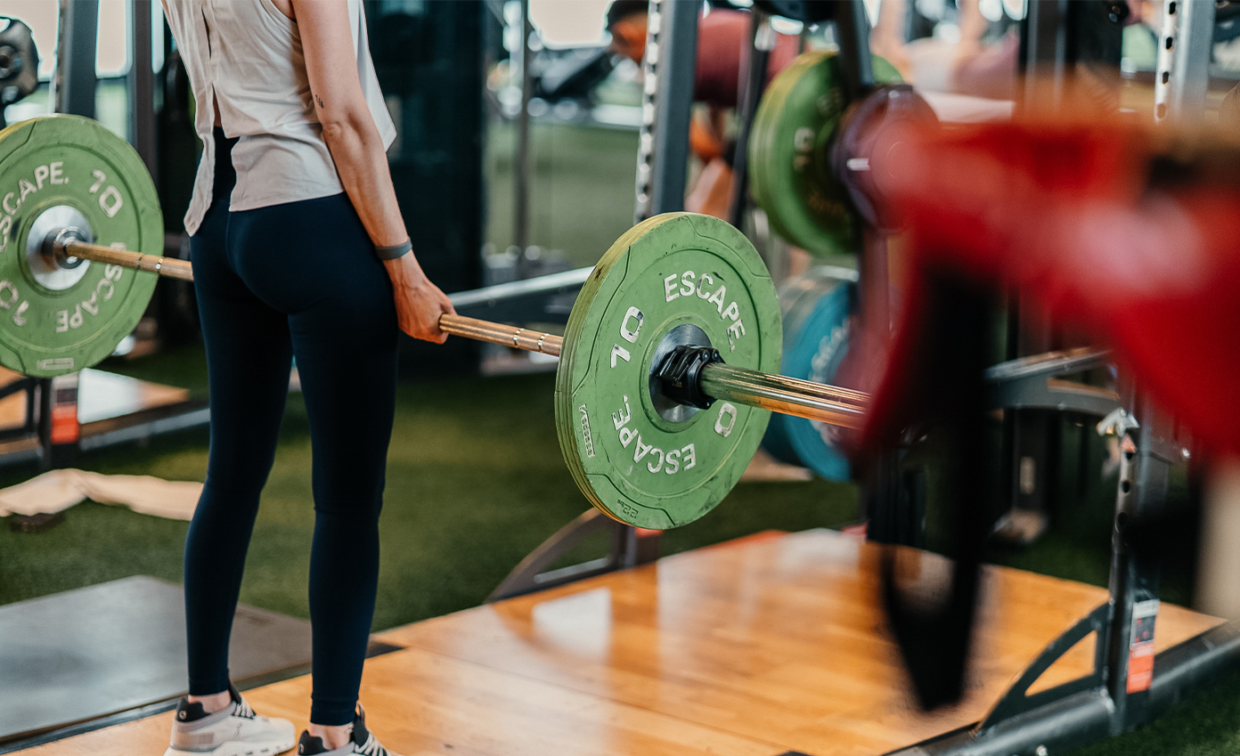 a person holding a barbell