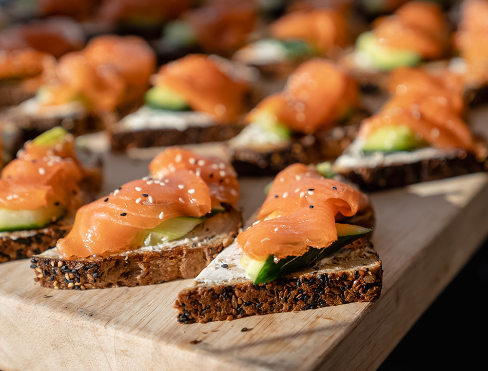 a group of food on a wooden board