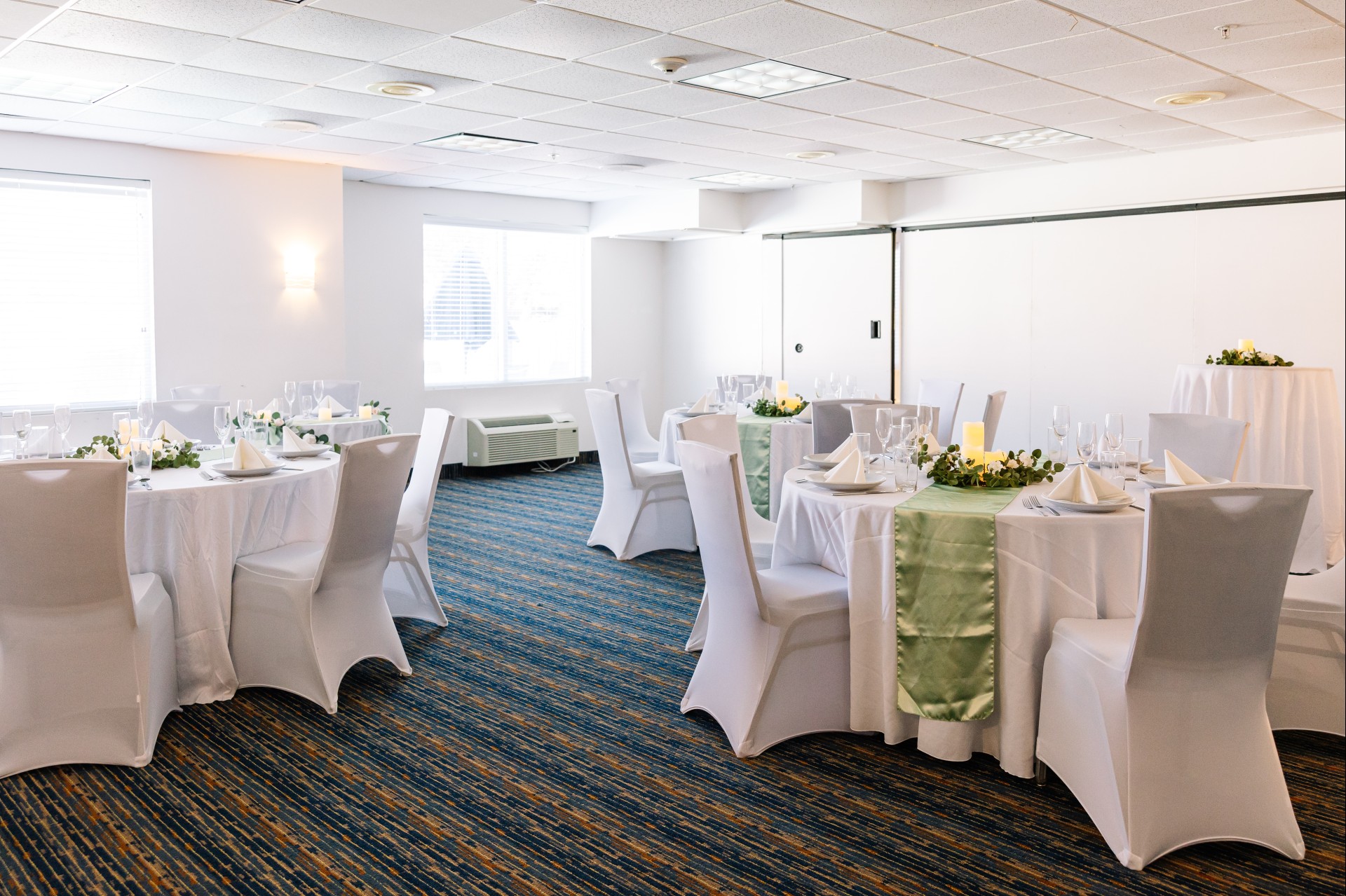 a room with tables and chairs