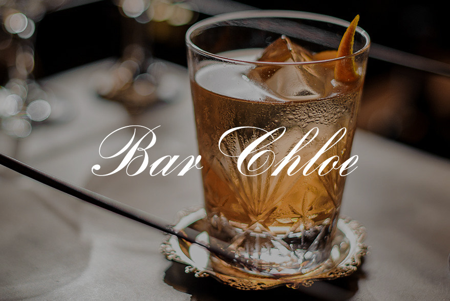 cocktail in a glass and bar chloe logo on top