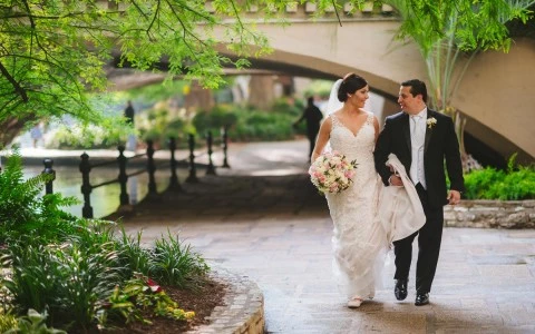 Couple who just got married walking in the street