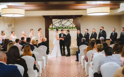Couple getting married and all the guest looking at them