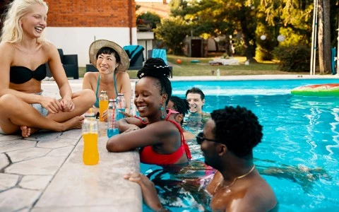 a group of people in a pool