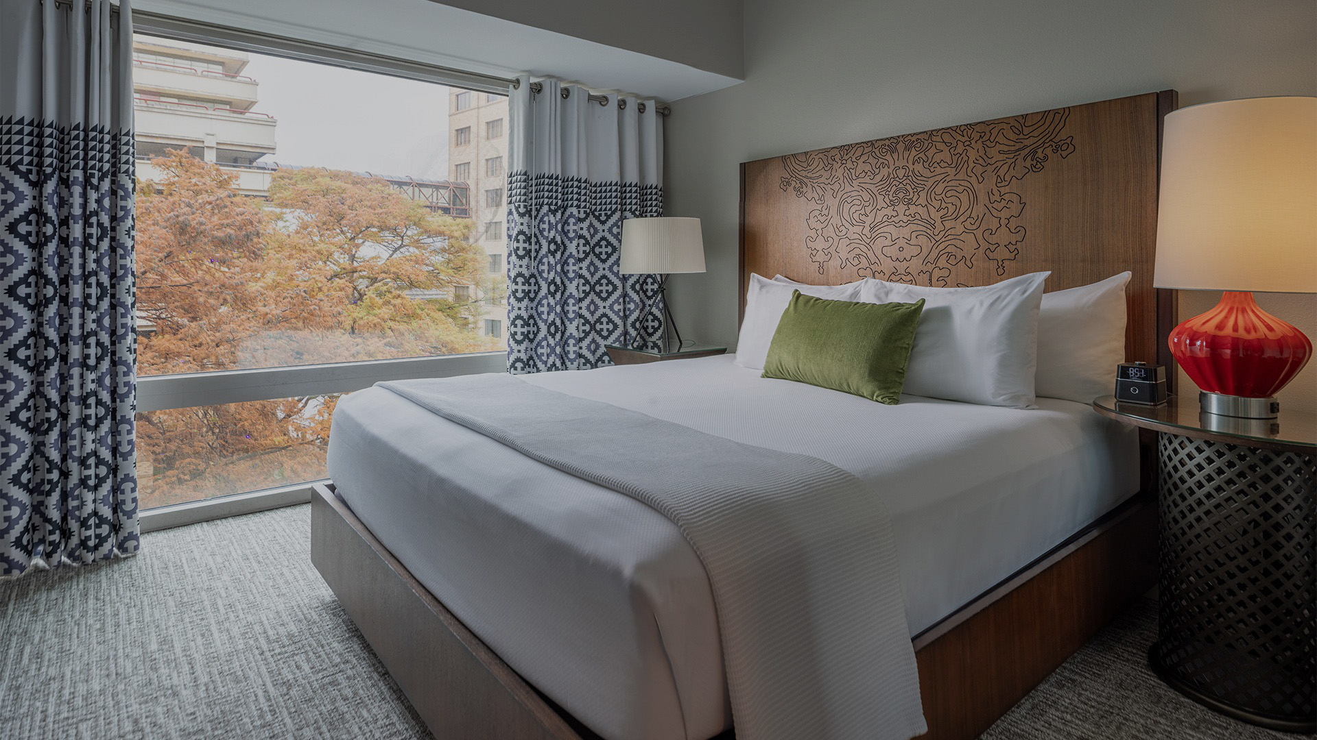 a bed with a large window