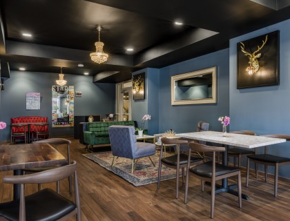 a room with a table and chairs