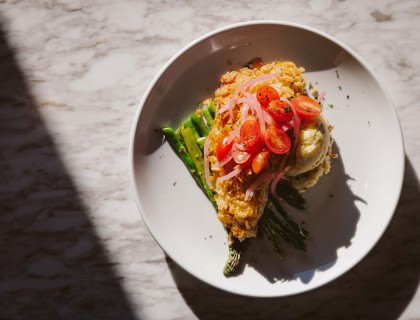 a plate of food on a marble surface