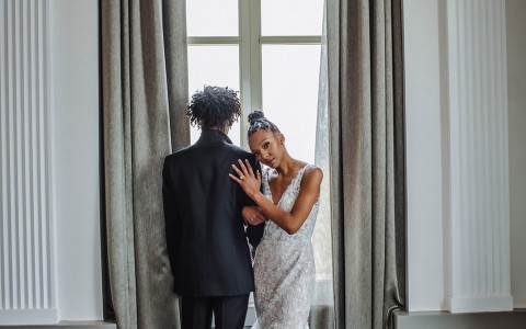 a man and woman in a wedding dress