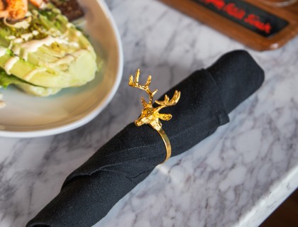 a napkin with a ring on it