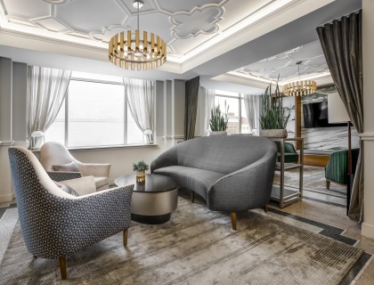 a room with couches and chairs