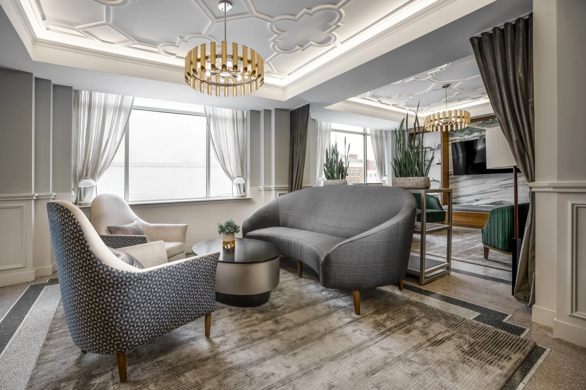 a room with couches and chairs
