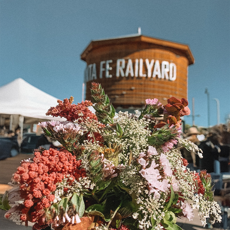 a bouquet of flowers in front of a building