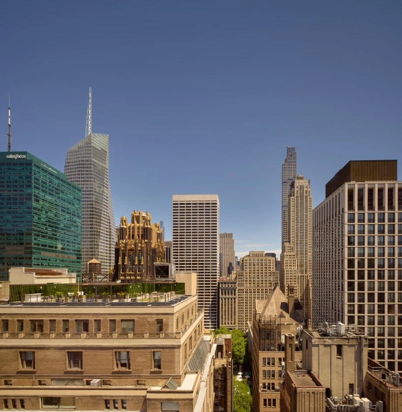 a city skyline with many tall buildings 