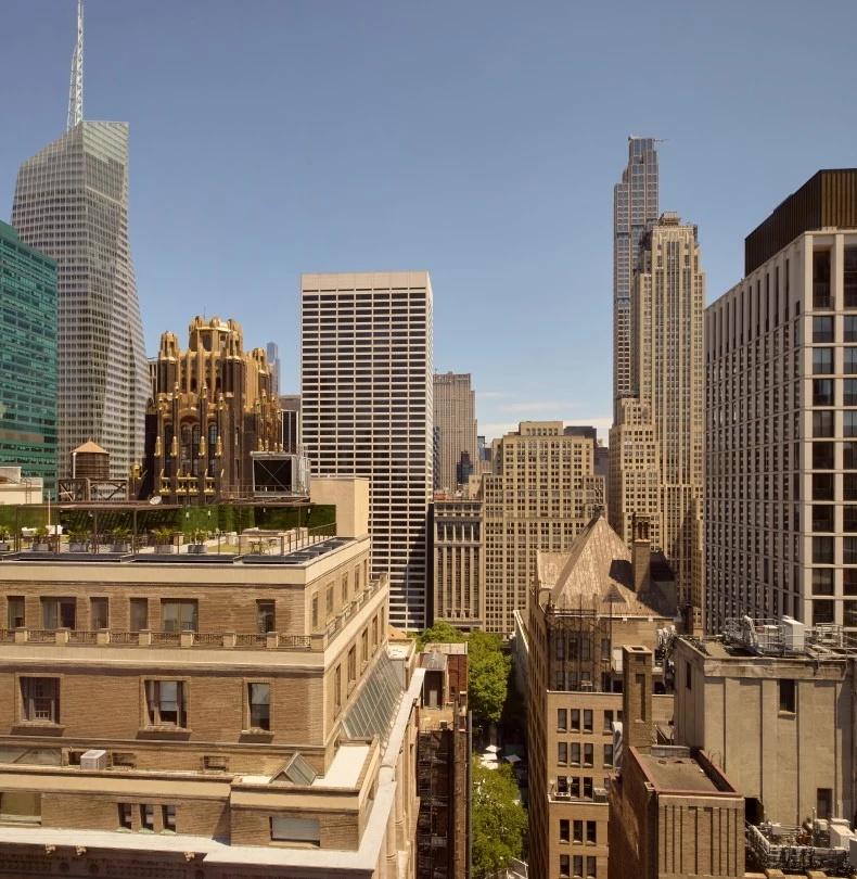a city skyline with many tall buildings 