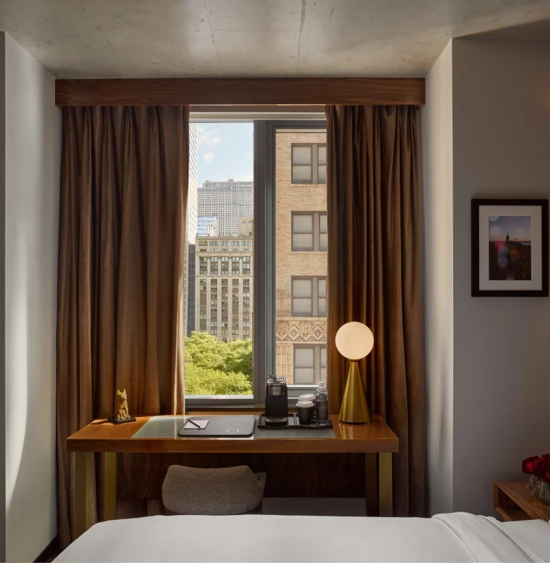 a desk in a hotel room 