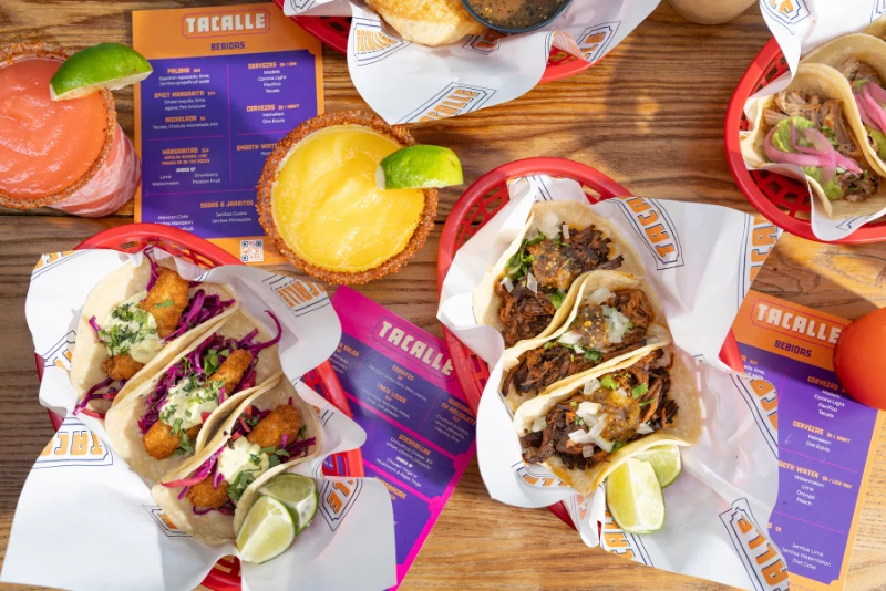 a group of tacos on a table