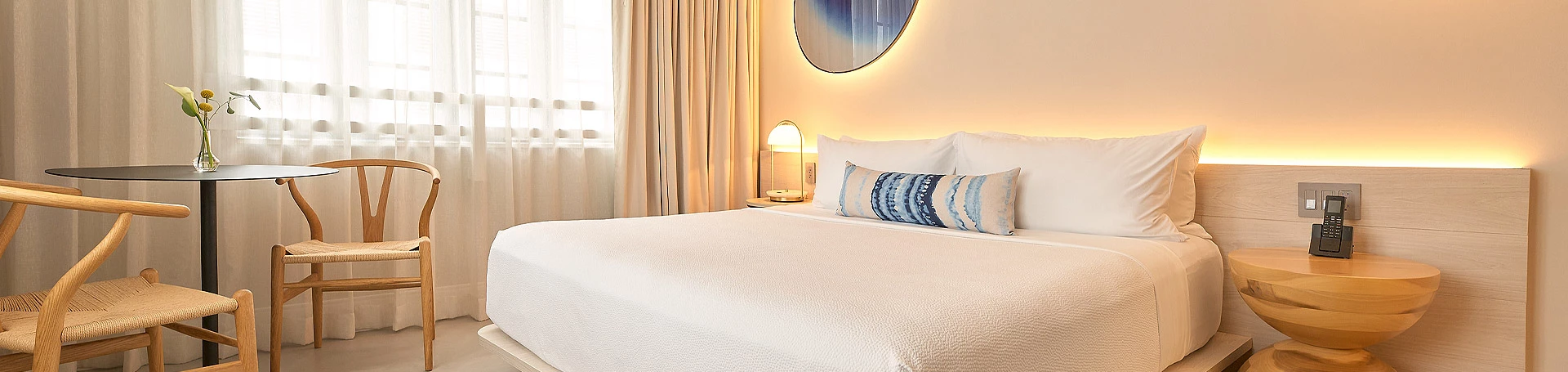 a bed with a white bed spread