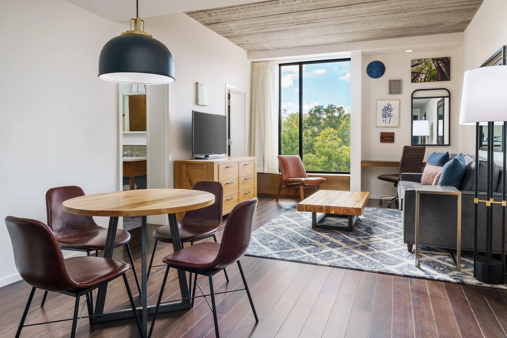 a room with a table and chairs