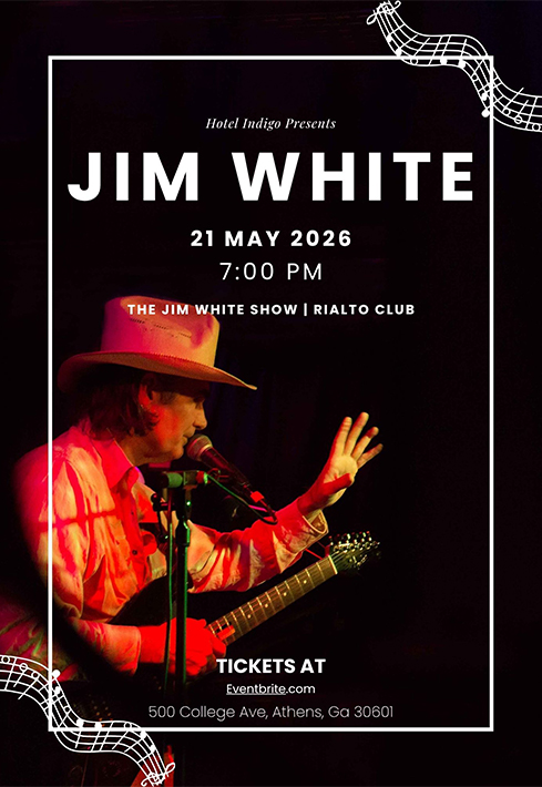 a man playing a guitar and singing