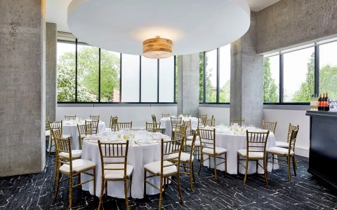 a room with tables and chairs