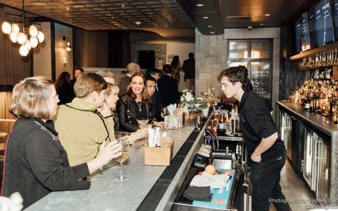 a group of people at a bar