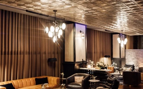 a room with a couch and tables