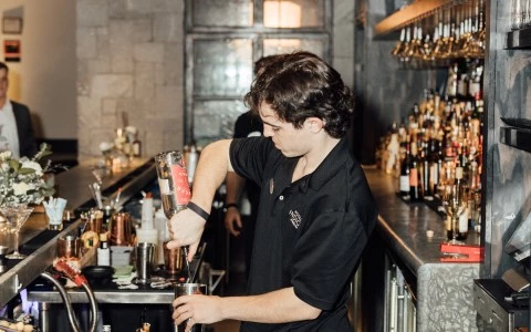 a man standing at a bar