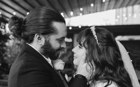 a man and woman kissing