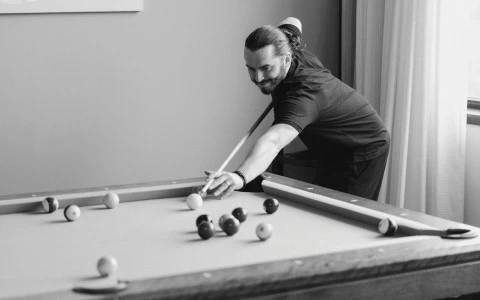 a man playing pool