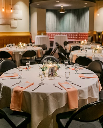 a group of tables set up for a party