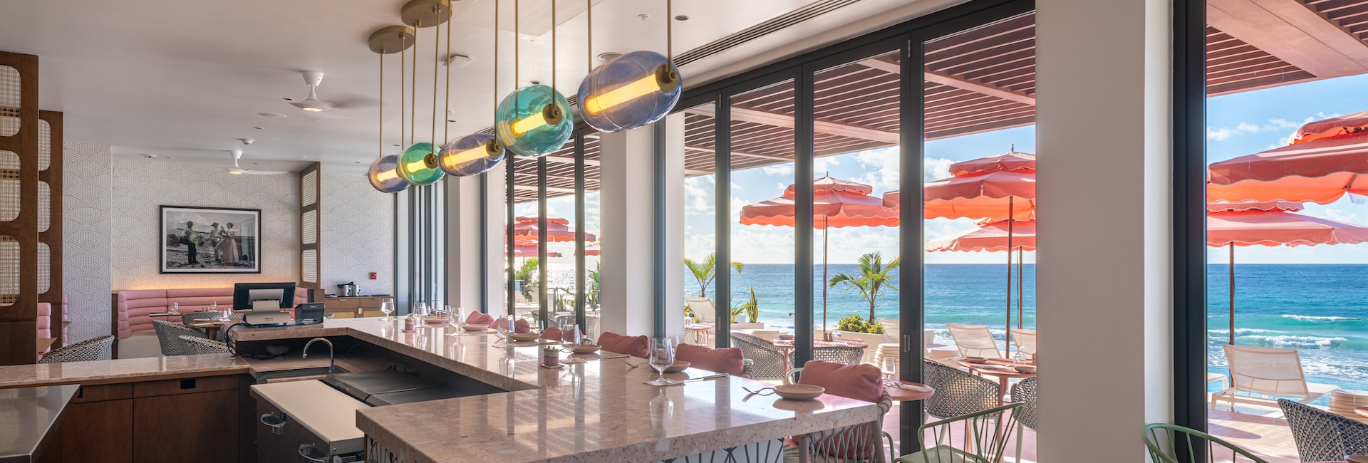 a restaurant with a view of the ocean