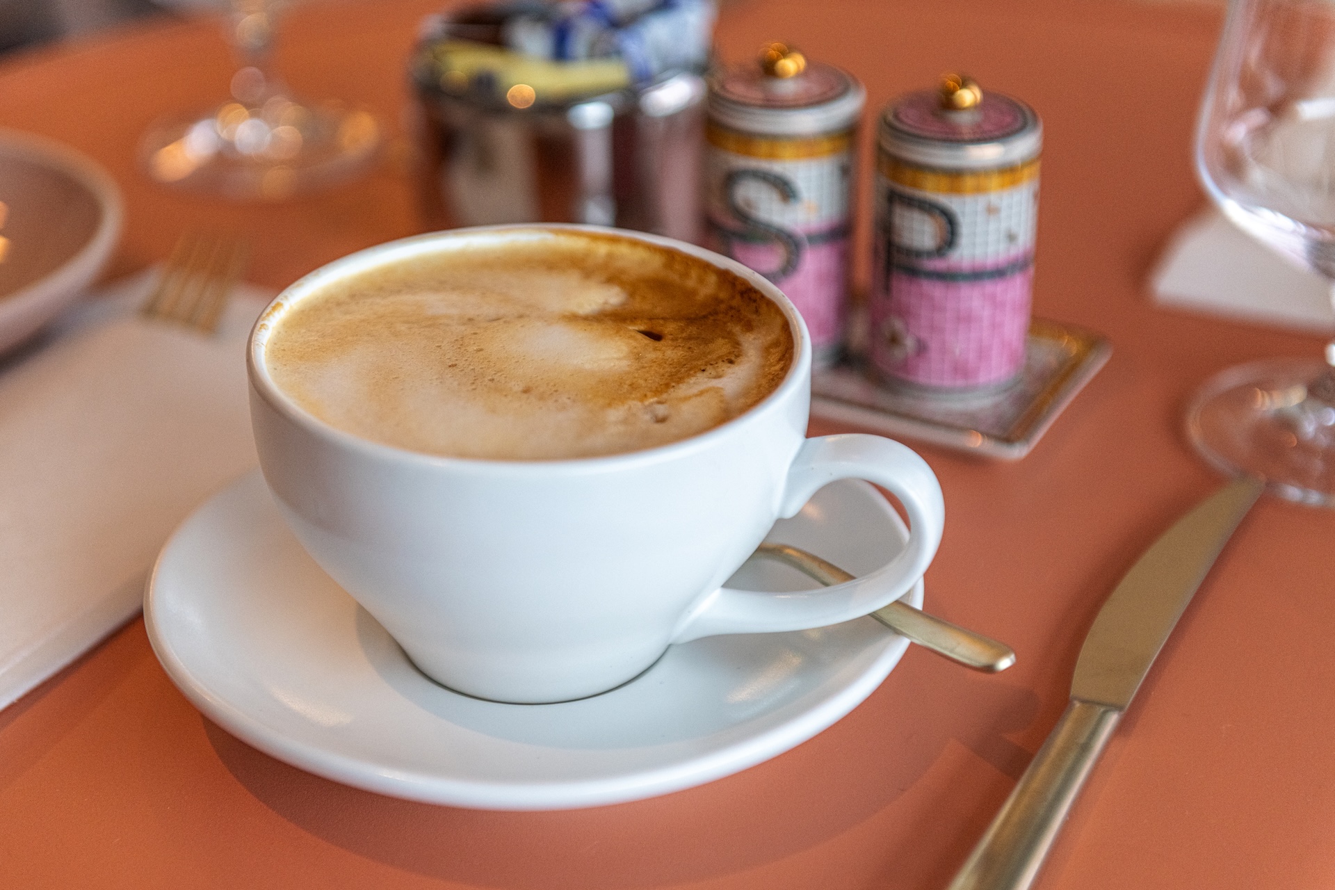 a cup of coffee on a saucer