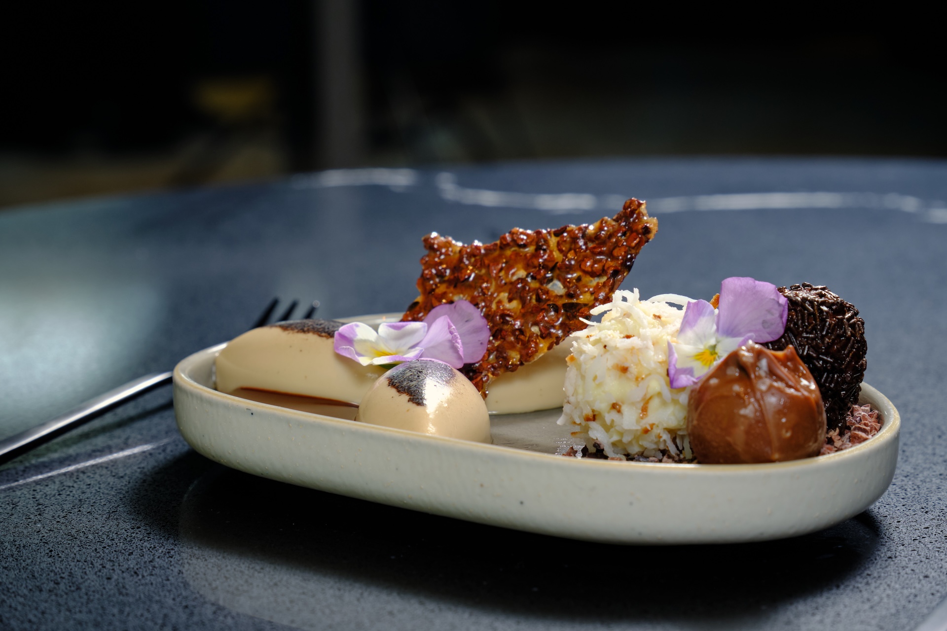 a plate of desserts on a table