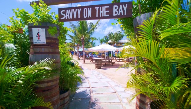 a sign on a beach