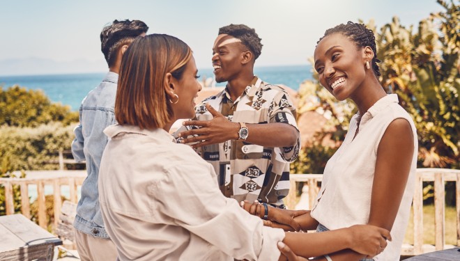 a group of people holding hands