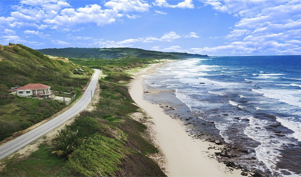 a road next to the ocean
