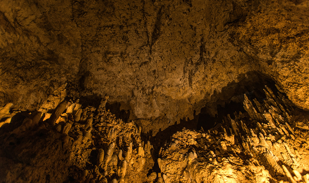 a cave with stalactites and rocks