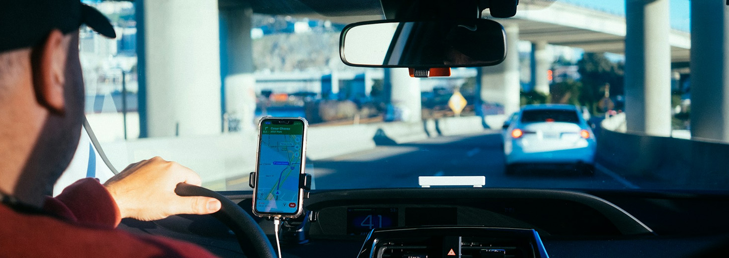 a phone on a car dashboard