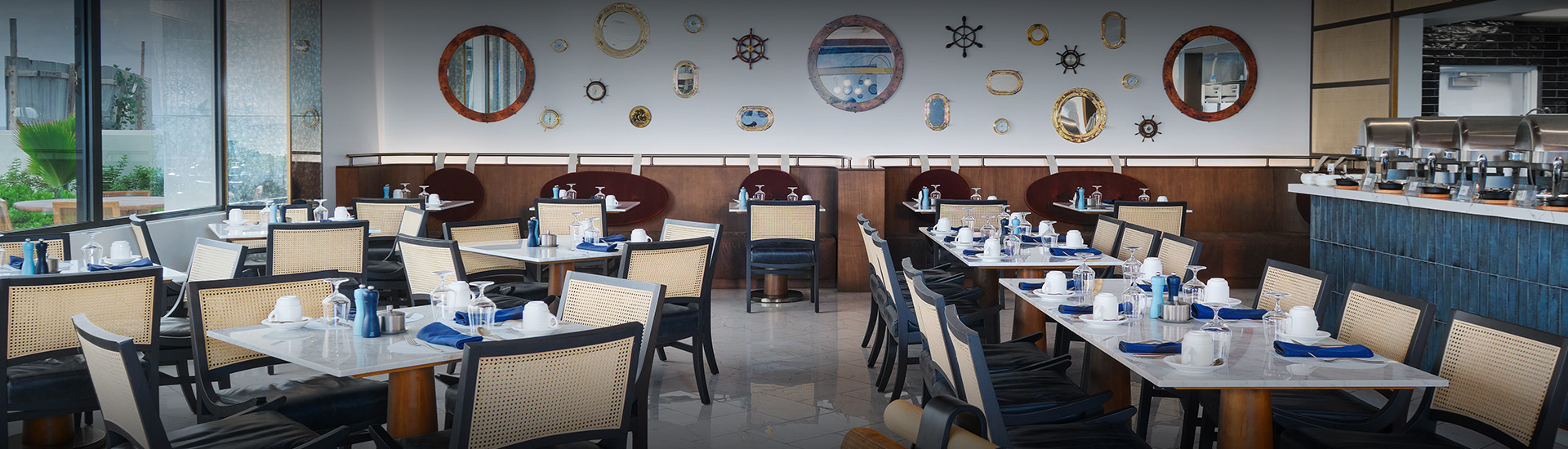 a restaurant with tables and chairs