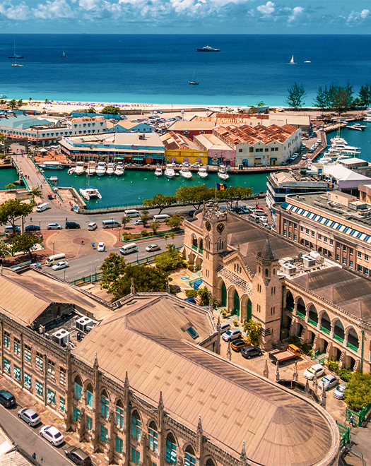 a city with many buildings and boats in the water