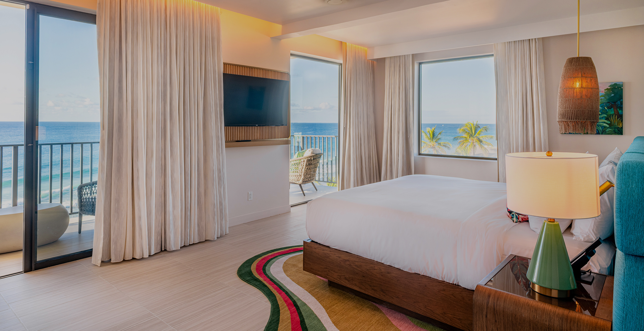 a bedroom with a television and a bed