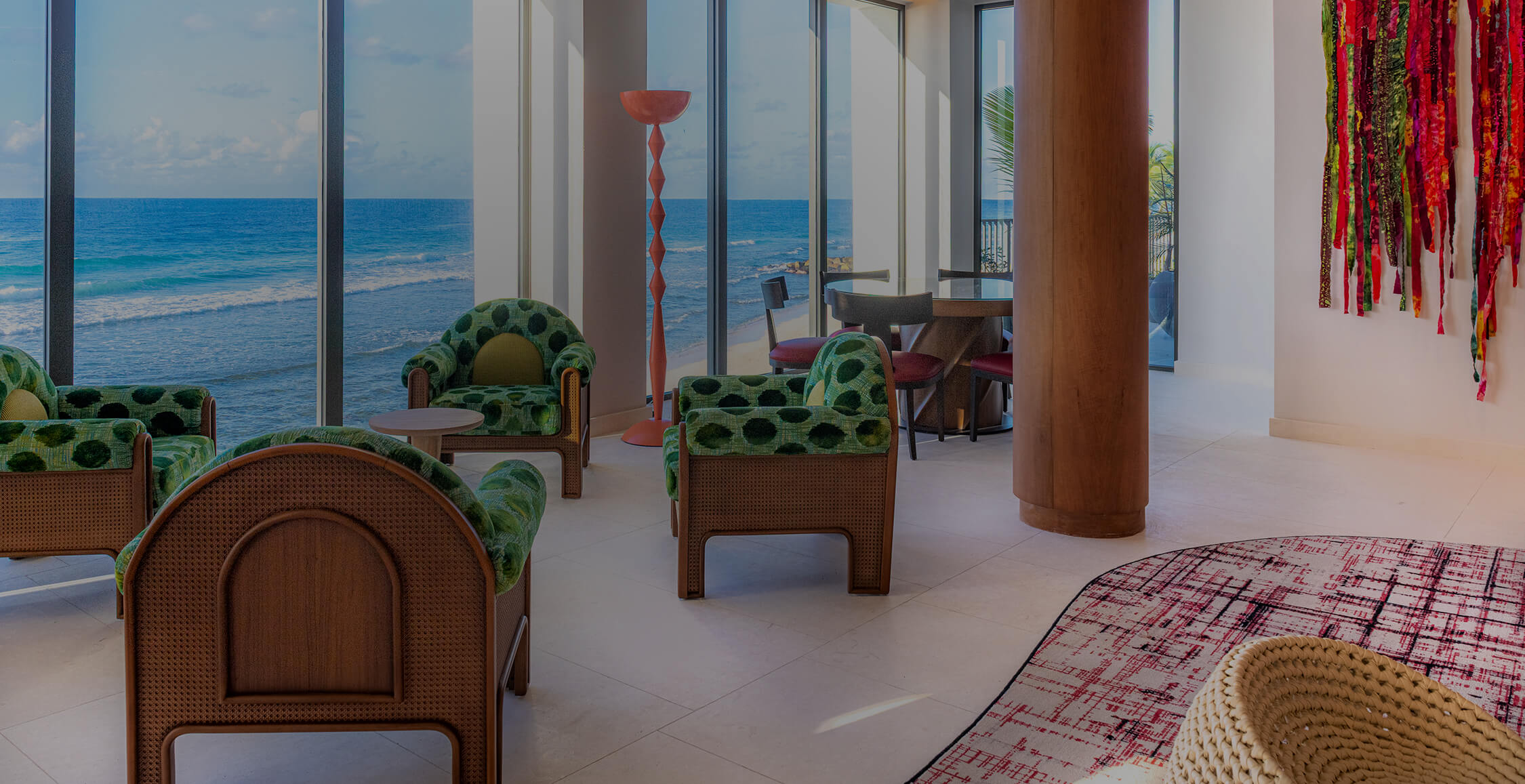 a room with chairs and tables and a rug