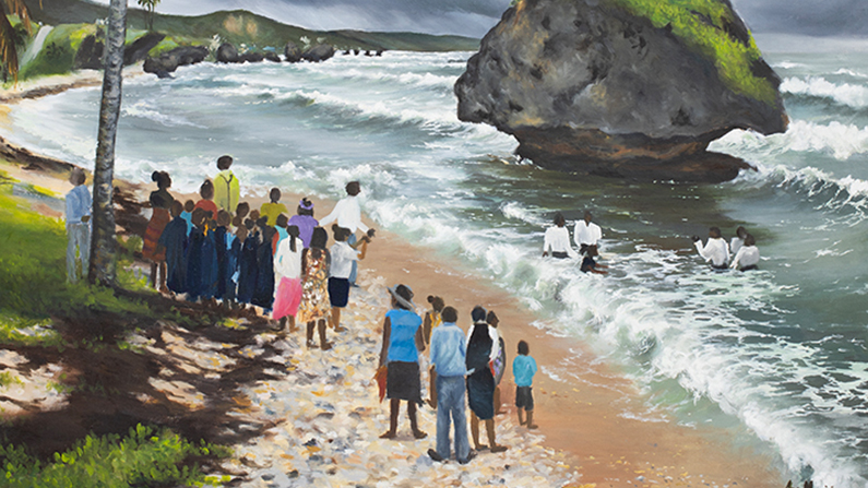 a group of people standing on a beach